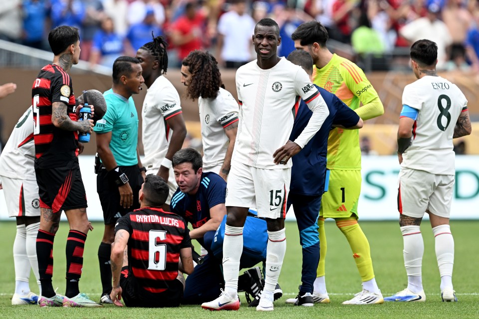 PHILADELPHIA, PENNSYLVANIA - JUNE 20: Nicolas Jackson #15 of Chelsea FC looks dejected after being shown a red card while Ayrton Lucas #6 of CR Flamengo is looked at by medical staff during the FIFA Club World Cup 2025 group D match between CR Flamengo and Chelsea FC at Lincoln Financial Field on June 20, 2025 in Philadelphia, Pennsylvania. (Photo by Darren Walsh/Chelsea FC via Getty Images)
