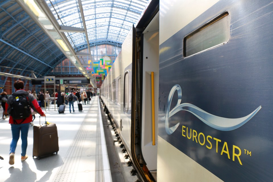 Eurostar train arriving at London St. Pancras station.