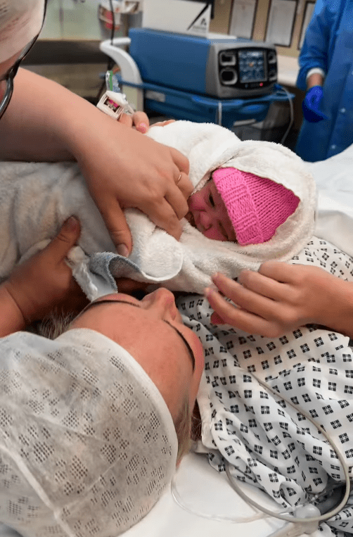 Mother and newborn baby skin-to-skin after birth.