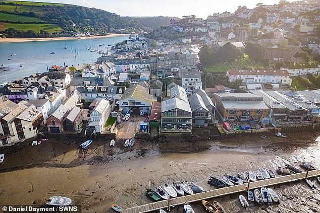 The developer (pictured, its four luxury apartments) had appealed South Hams District Council's 2019 rule that any new homes in the coastal resort town must be primary residences