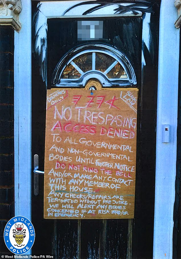 The sign on the front door of the couple's home in Birmingham