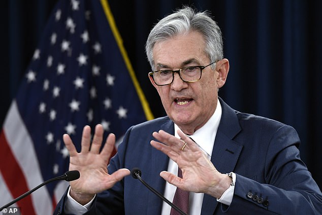 Defiant: Federal Reserve chairman Jay Powell (pictured) is determined to preserve the US central bank's independence in the face of fierce criticism from President Trump