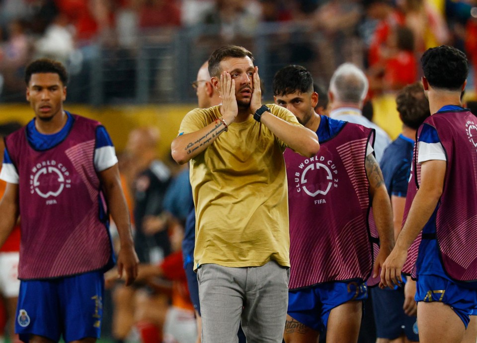 FC Porto coach reacting during a soccer game.