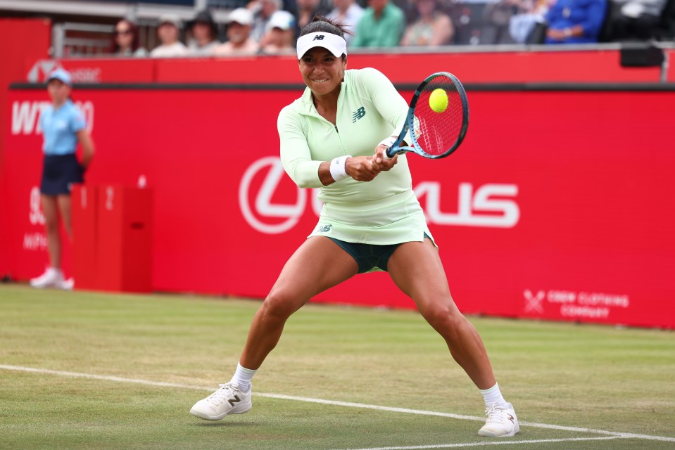 Heather Watson playing tennis.