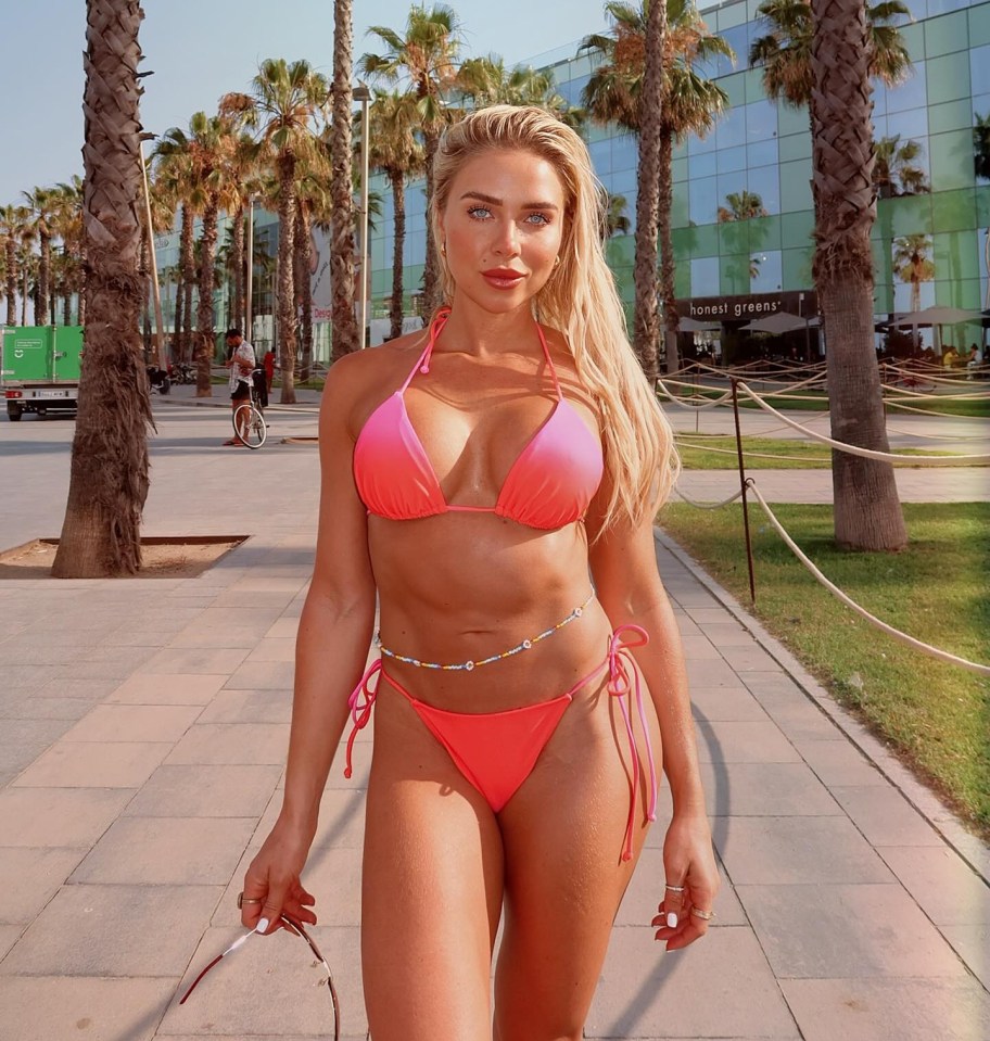 Gabby Allen in a pink bikini in Spain.