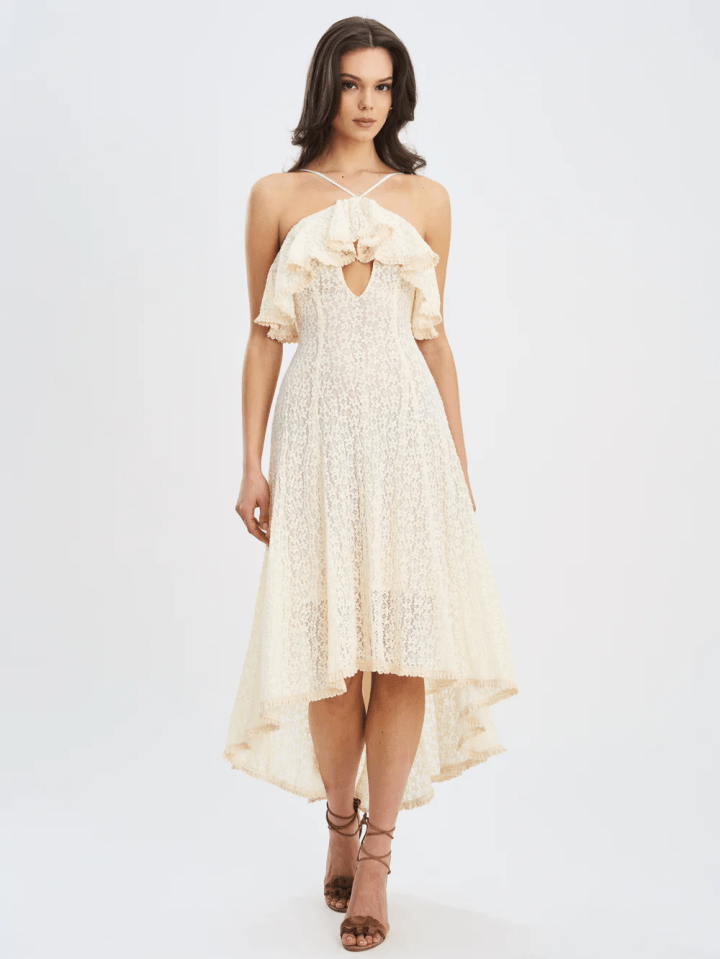 Woman in a high-low lace dress.