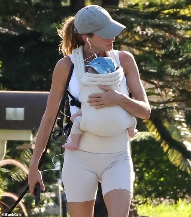 Gisele Bundchen was seen with her newborn baby boy when taking a stroll alone in Florida on Monday. The siren from Brazil had her third child, whom she shares with partner Joaquim Valente, strapped to her chest in a $366 off-white baby carrier from Zeitgeist Spirit