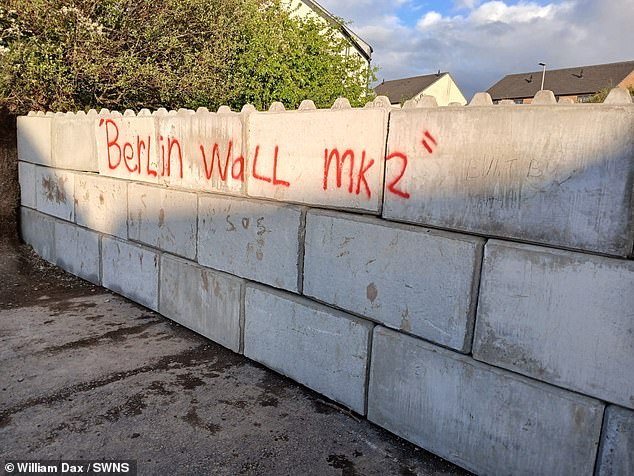 The 2-meter concrete barrier, which was hastily and mysteriously erected over the Easter holidays, completely cut off a walking route used by residents to get their children to St James Primary School in Oklehampton, Devon