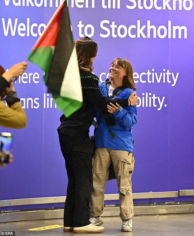 Swedish activist Greta Thunberg (R) arrives at Arlanda airport outside Stockholm, Sweden, on June 10, 2025