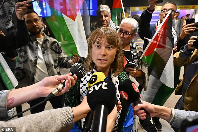 Swedish activist Greta Thunberg talks to journalists as she arrives at Arlanda airport outside Stockholm