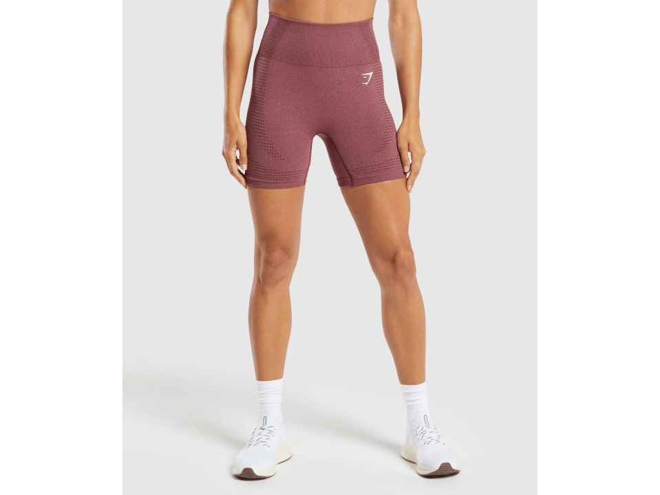 a woman is wearing a pair of shorts that say gymshark
