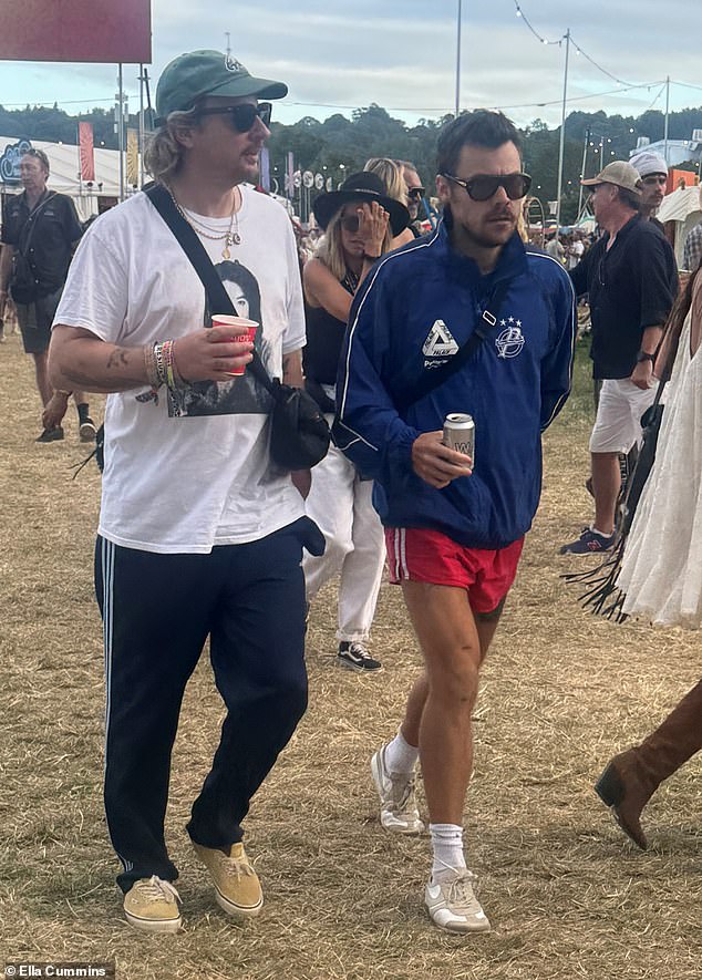 Harry Styles' mystery new woman has reportedly been revealed after the pair were seen passionately snogging in the VIP area of Glastonbury Festival over the weekend