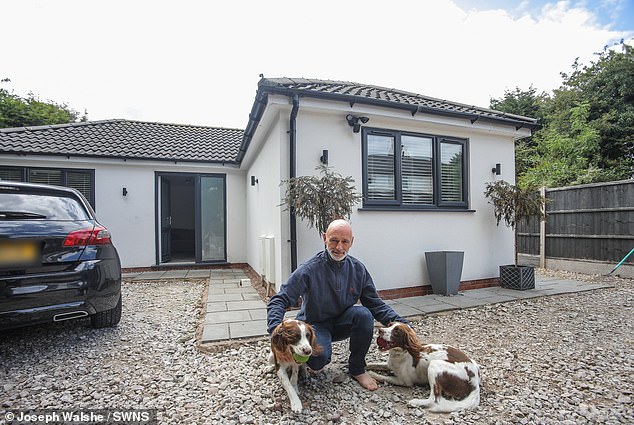Mark Jones (pictured), 55, has been ordered to tear down an £180,000 garden bungalow he built without planning permission. He argues that the demolition will leave him on the streets