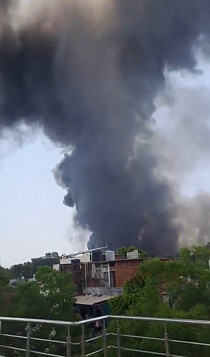 Shocking images shared to social media showed a huge trail of smoke emanating from the crash site near the international airport this morning