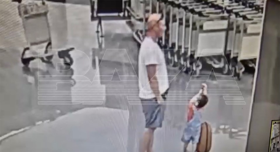 CCTV footage of a man throwing a toddler to the ground.