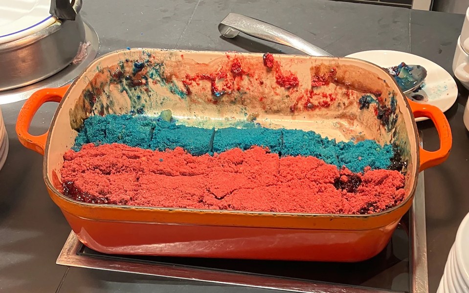 Pride crumble dessert in an orange dish.