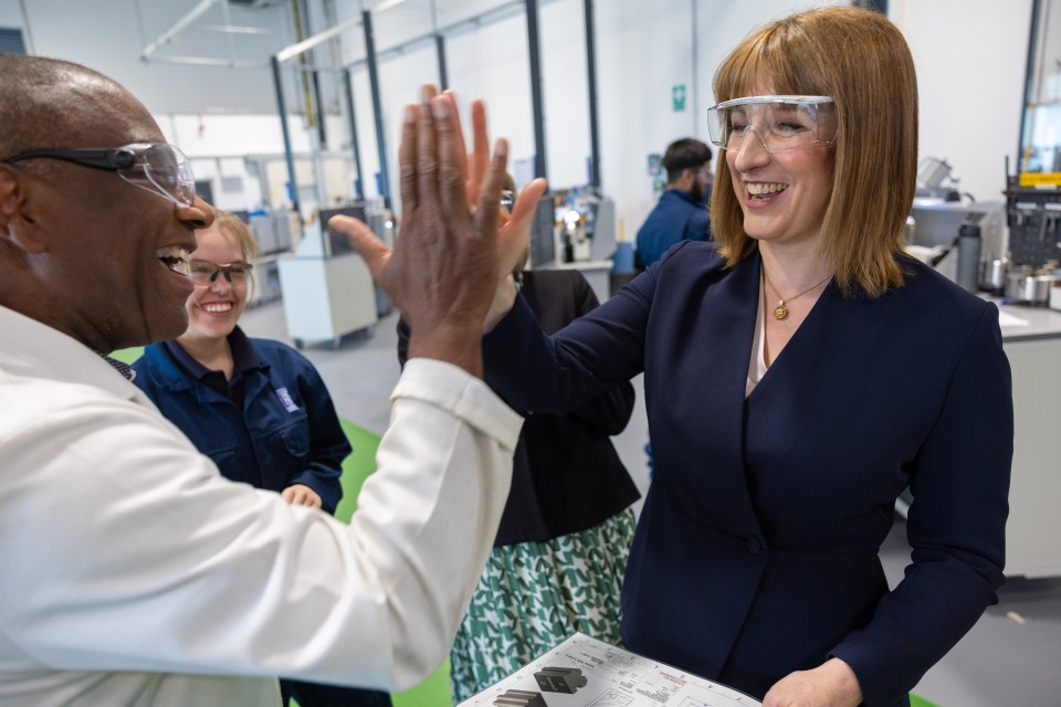 Chancellor of the Exchequer Rachel Reeves high-fiving staff at the Nuclear Skills Academy.