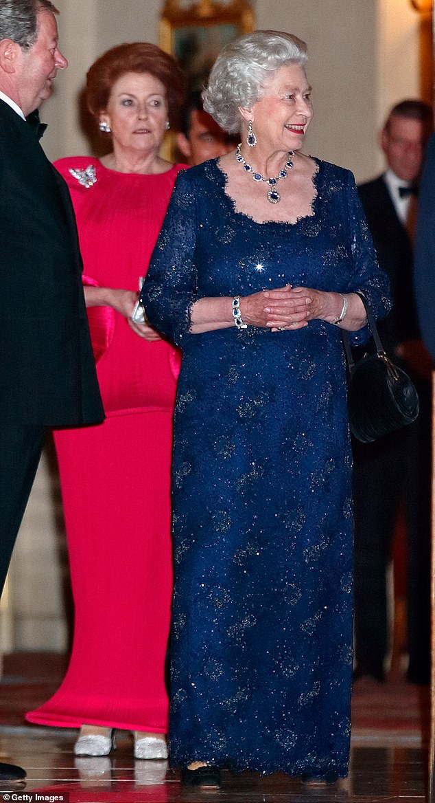 Lady Elizabeth Anson, pictured left in red behind the Queen, was not only Elizabeth's cousin, but one of her closest friends, having supported the monarch through the deaths of her mother, the Queen Mother, and sister, Princess Margaret