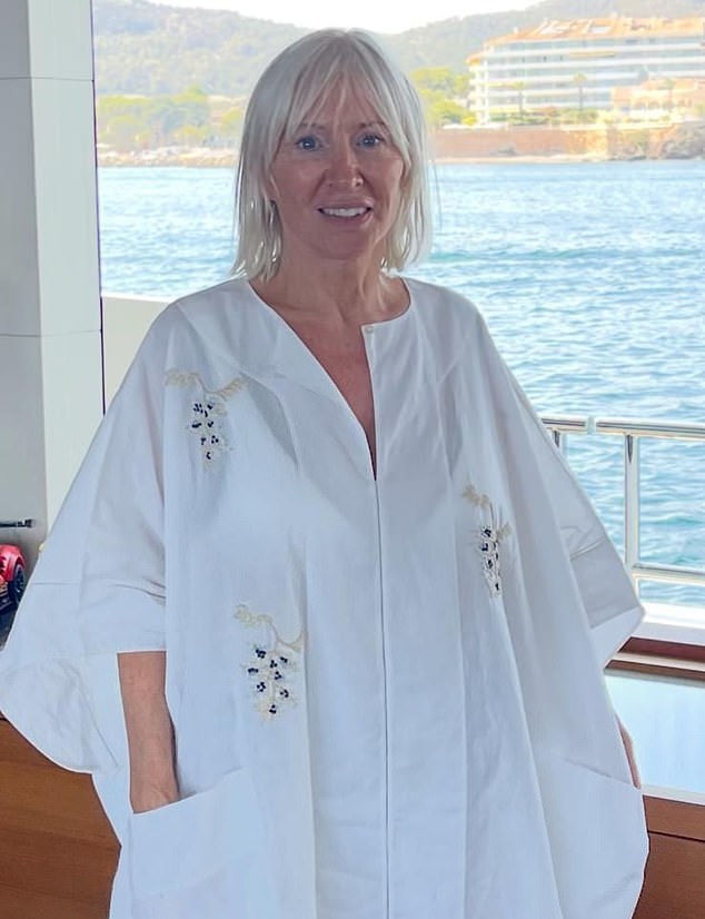 Nadine says on holidays she would take an assortment of clothes that were 'brightly coloured, shapeless sacks' to hide her weight