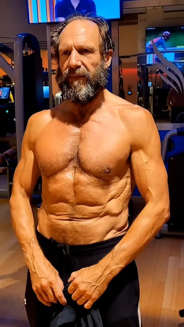 Fiennes (pictured) observed a high protein diet teamed with a gruelling exercise regime to become more ripped than ever