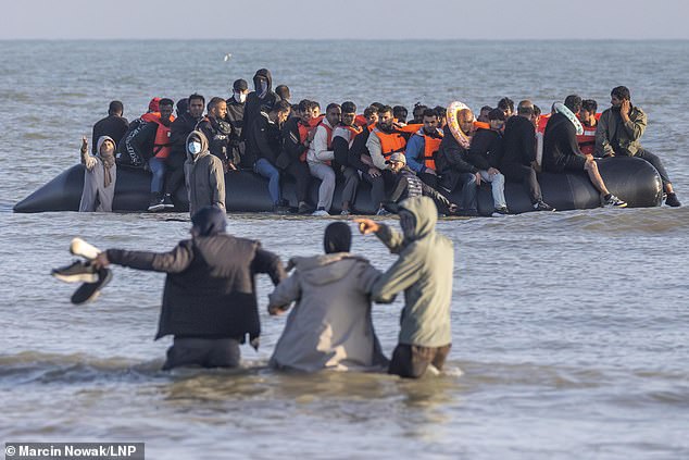 A huge boat of migrants was able to leave French shores this morning - because the police were standing in the wrong place