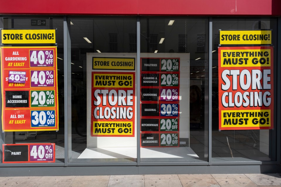 Wilko store closing sale signs in Cheltenham, UK.
