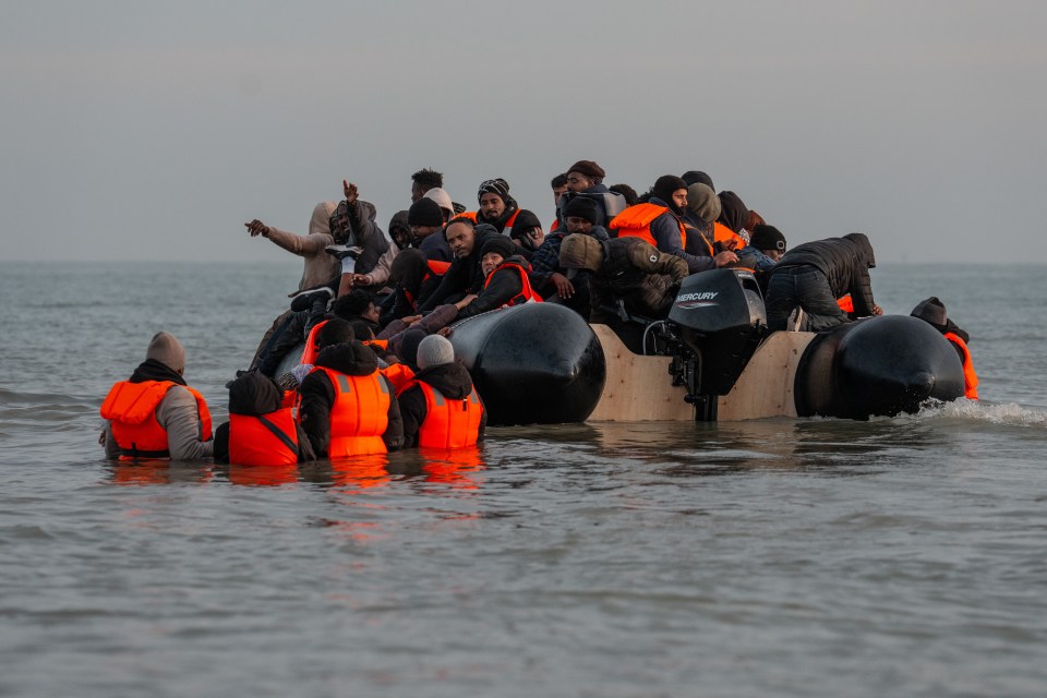 Migrants in a small boat in the English Channel.