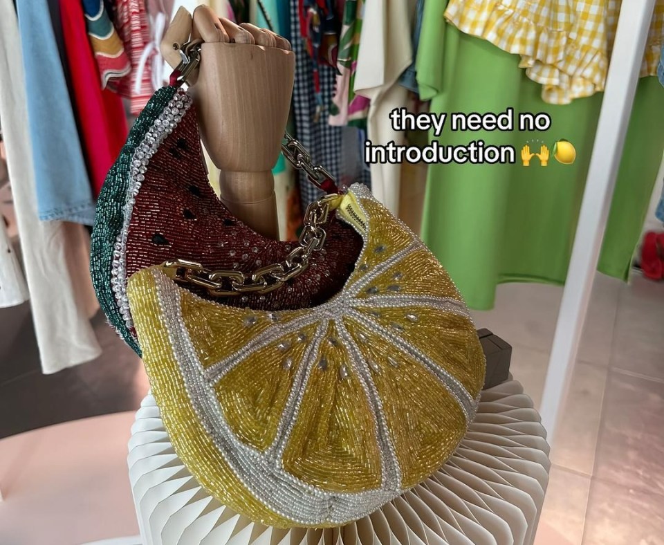 Beaded watermelon and lemon purses on display.