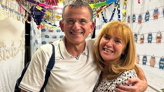 Angela Epstein, pictured with her husband Martin. Just 24 hours after calling her two friends - an eye surgeon and his wife, an optometrist - she had sight-saving surgery