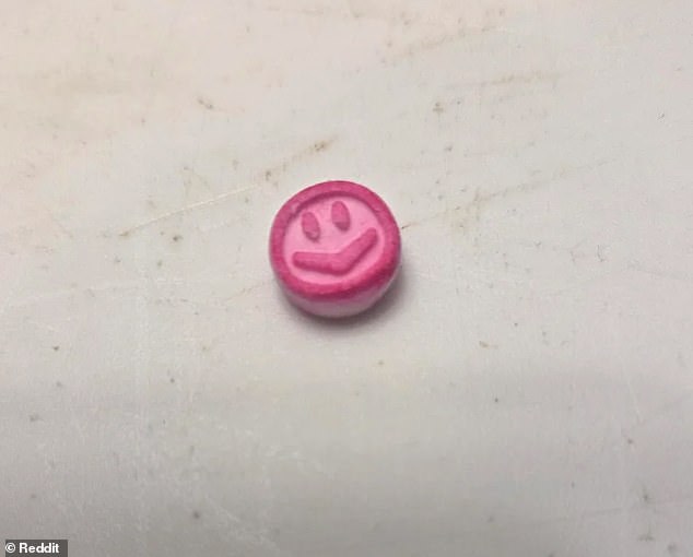 A Reddit user, strawberrybalsamic, was left dumbfounded this week after spotting a miniature, bright pink smiley face staring up at him from inside the washing machine - its seemingly unexplainable origin leaving him completely puzzled (pictured)