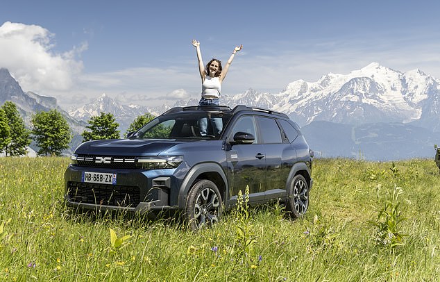 Erin Waks camps out in a car for the night in the Alps 'with a perfect view of a snow-covered Mont Blanc peak in front of me, and grassy, imposing hills, peaks and mountain ranges on either side'