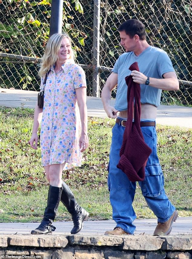 Channing Tatum plays infamous robber Jeffrey Manchester in his forthcoming movie 'Roofman.' (Pictured on set in Charlotte, North Carolina with Kirsten Dunst who plays his unwitting girlfriend Leigh Wainscott)