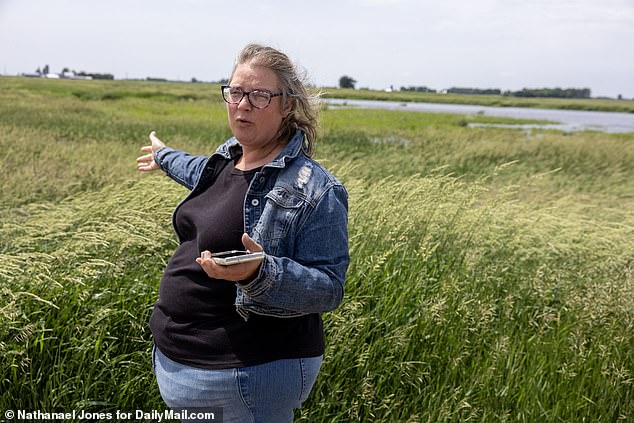 Wendy (pictured), who was on the phone with her dad when she spotted Boelter, said she originally thought he was a part of the SWAT team until he squatted down