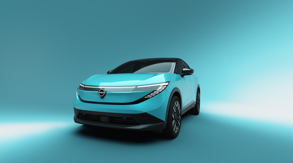 Light blue Nissan Leaf electric car.