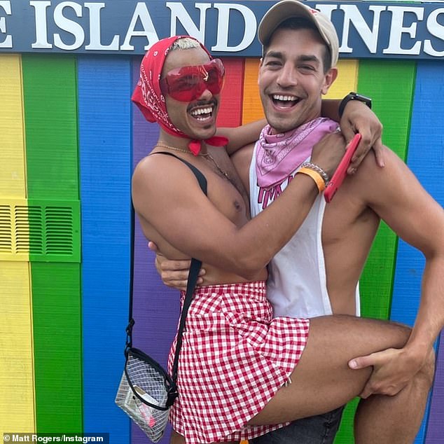 Matt Rogers (right), who starred in 2022's Fire Island, is pictured behind the scenes of filming