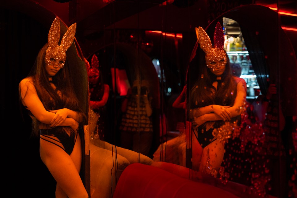 A dancer in a bunny mask at a Kharkiv nightclub.
