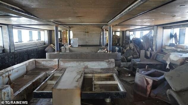 Eerie images have revealed the inside of the doomed Bayesian, with the once luxurious reception room now rotted