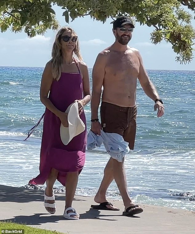 Now, Baumgartner is planning to tie the knot with fiancé Josh Connor in a low-key ceremony in Hawaii, where the couple were seen vacationing in July 2023 (pictured)