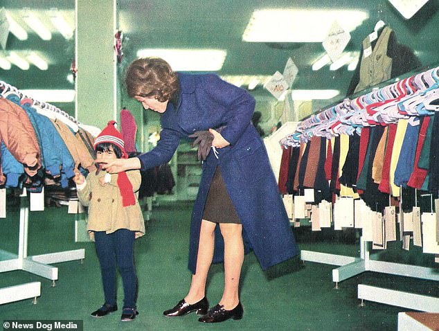 A mother was seen shopping for her young son in the children's section of a Tehran department store, 1971