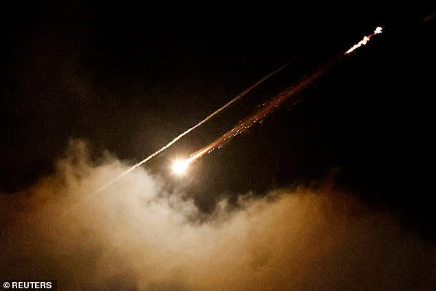 A missile launched from Iran towards Israel is seen from Ramallah, Israeli-occupied West Bank, June 16, 2025