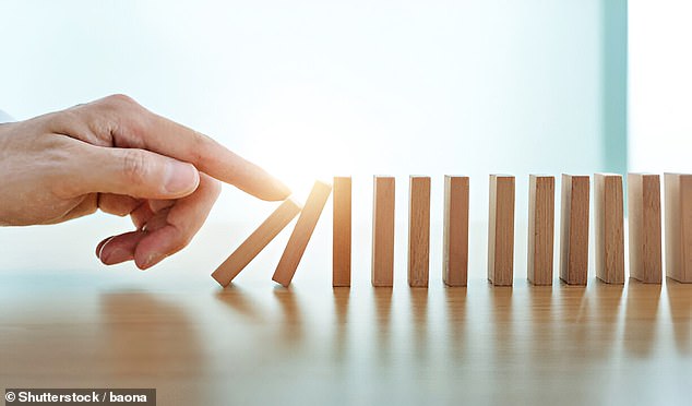 Professor Ian Moss, a cosmologist at Newcastle University, told MailOnline that the universe is like 'a table-top with many dominoes standing on their side.' It is stable for now but could collapse at any moment if pushed