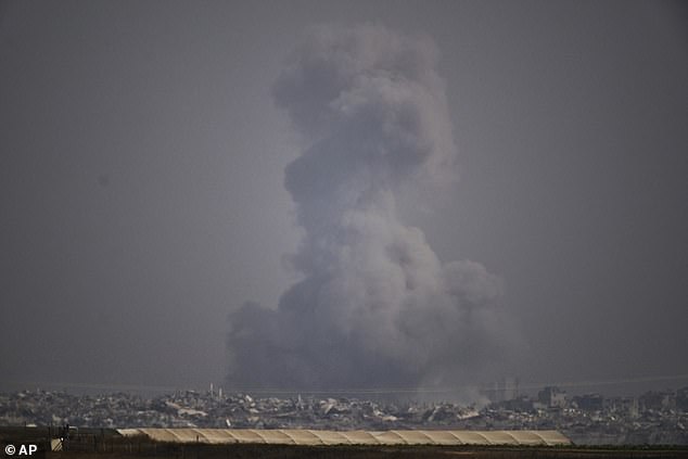 The Israeli military issued an evacuation order for residents of parts of Gaza City on Friday ahead of an attack. Pictured: Smoke rises to the sky following an Israeli strike in the Gaza Strip as seen from southern Israel, Friday, June 6