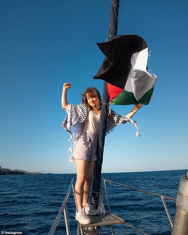 Israel has threatened to block Greta Thunberg's Freedom Flotilla from delivering aid to Gaza . The young activist is seen on board the ship, flying the Palestinian flag