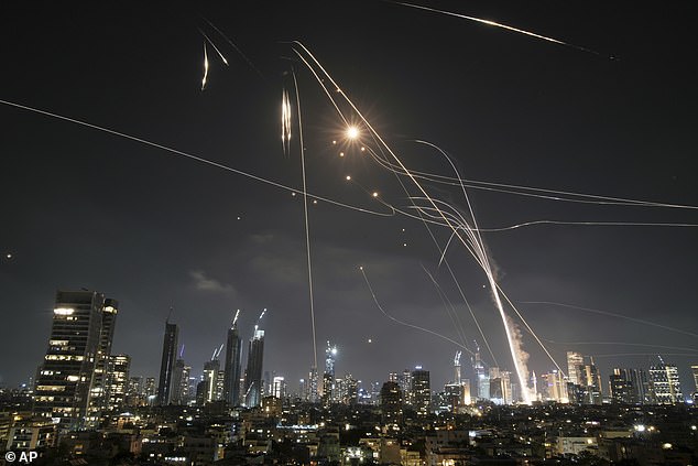Israeli Iron Dome air defence system fires to intercept missiles over Tel Aviv