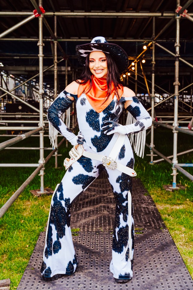 Jade Thirwall at Mighty Hoopla festival in a cow-print jumpsuit and cowboy hat.
