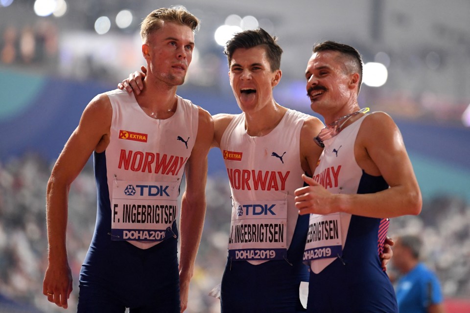 Three Ingebrigtsen brothers celebrating after a race.