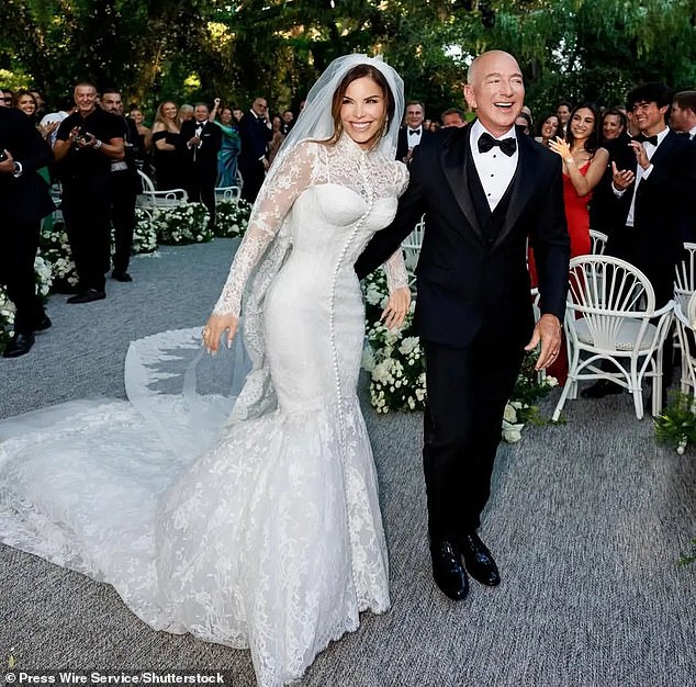 The backlash to the Bezos wedding has begun - as Lauren (pictured) has been accused of 'ripping off' royal wedding dresses