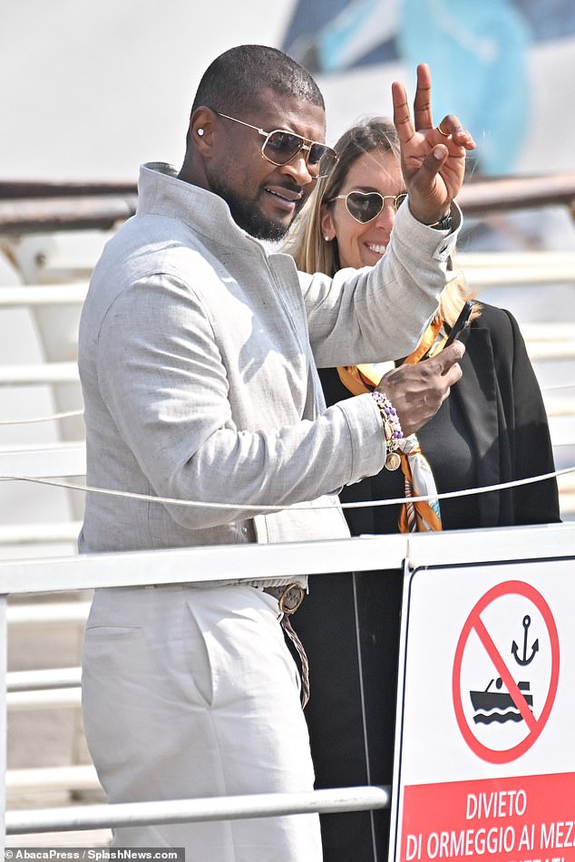 Popular R&B singer Usher , 46, was photographed departing the Venice airport on Thursday afternoon
