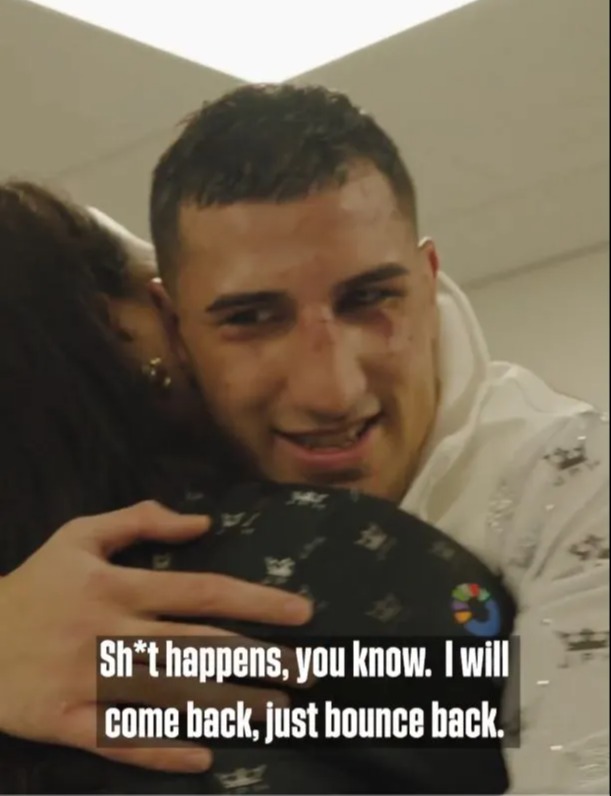 A man hugging a person, saying "Sh*t happens, you know. I will come back, just bounce back."