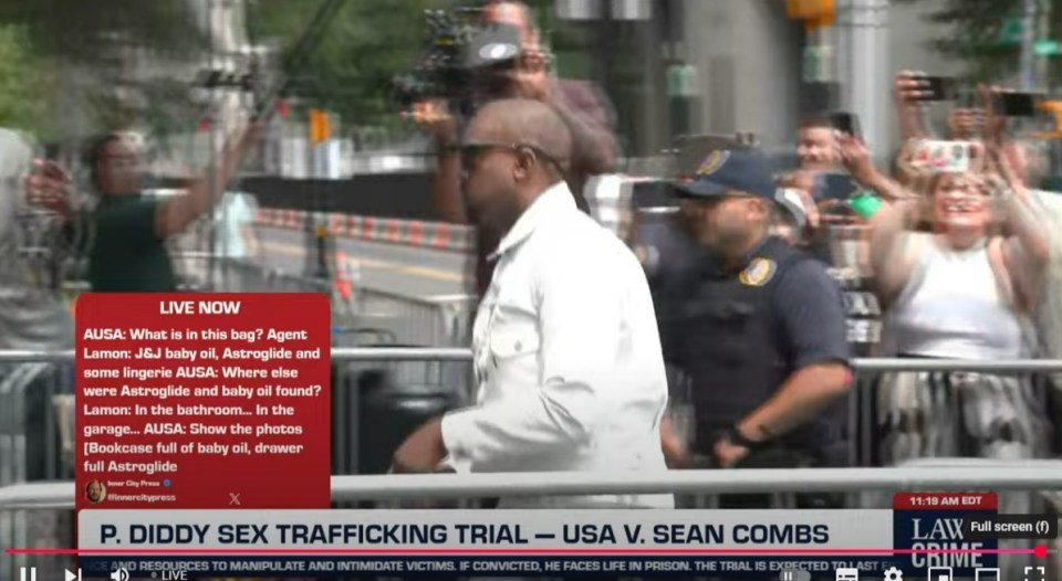 Screenshot of Kanye West walking past a crowd of onlookers and photographers outside a courthouse, with a news chyron about the P. Diddy sex trafficking trial.